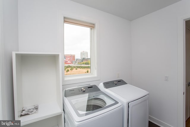 laundry room featuring washing machine and dryer