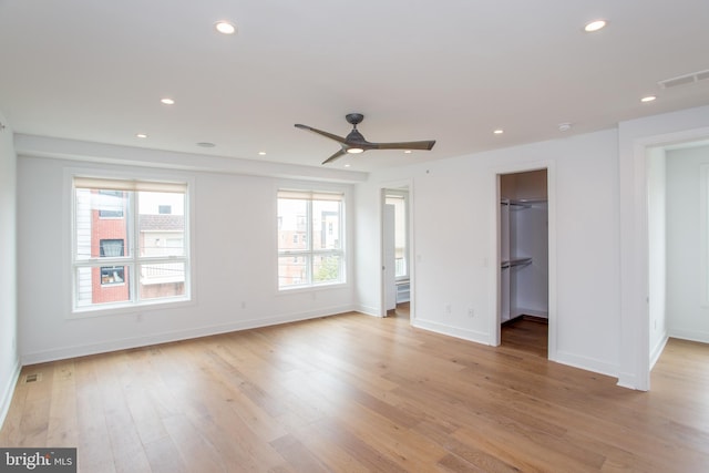 interior space featuring ceiling fan and light hardwood / wood-style flooring