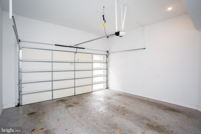 garage featuring a garage door opener