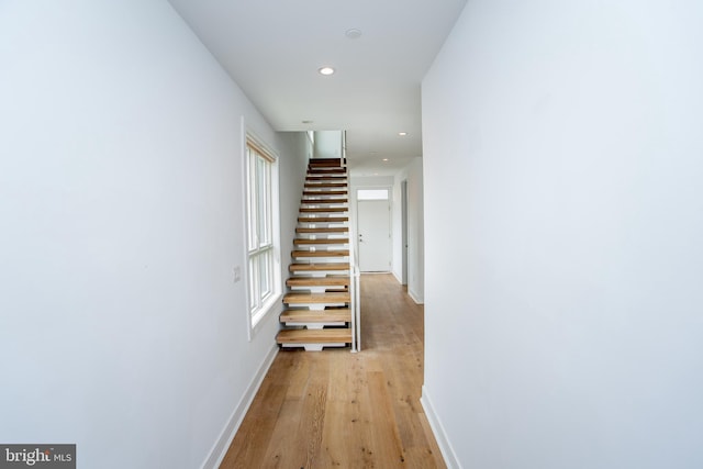 corridor featuring light hardwood / wood-style flooring