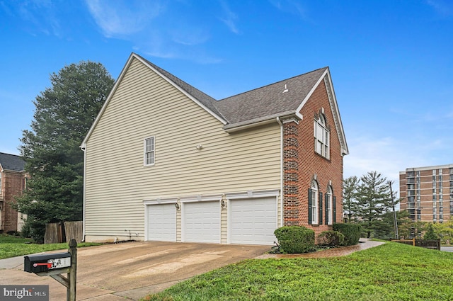 view of property exterior featuring a garage and a yard