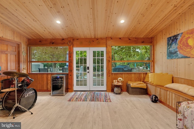 sunroom with french doors, wine cooler, and wood ceiling