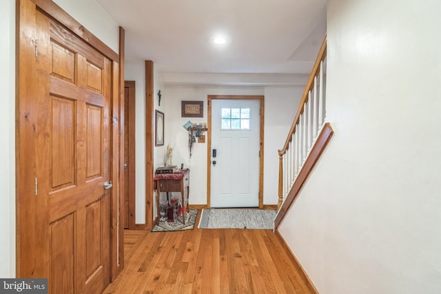 foyer with light hardwood / wood-style floors