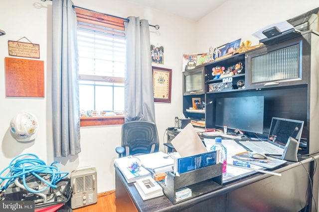 office space featuring hardwood / wood-style floors