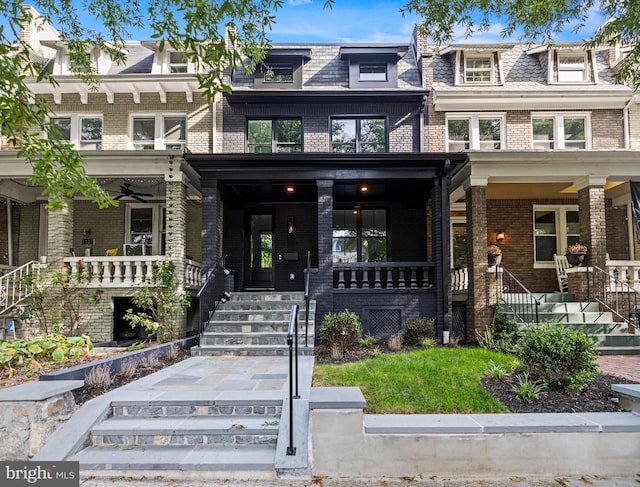 townhome / multi-family property with ceiling fan and a porch