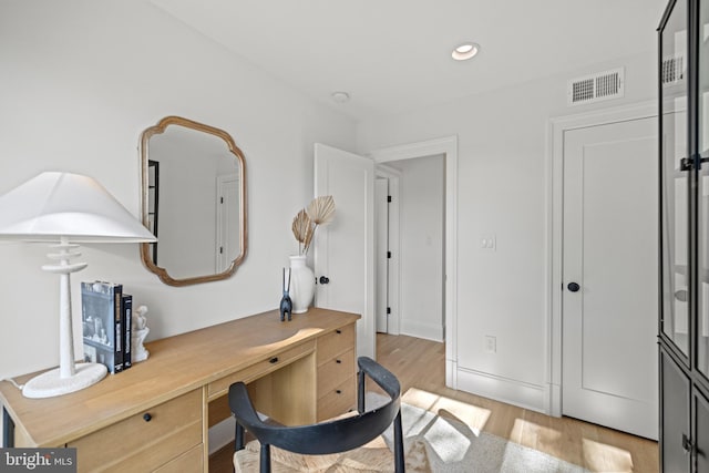 office space featuring light hardwood / wood-style floors