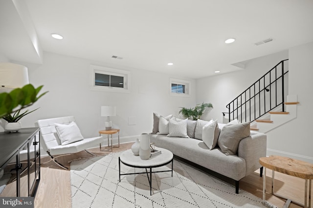 living room with light hardwood / wood-style floors