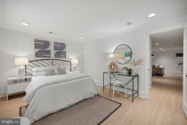 bedroom with light hardwood / wood-style flooring