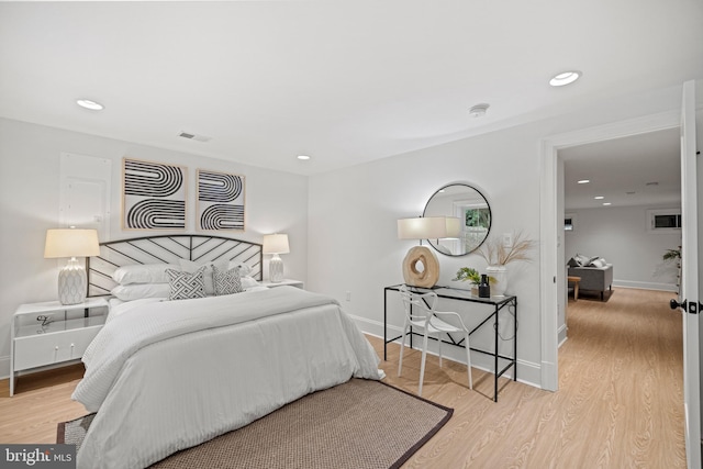 bedroom featuring light hardwood / wood-style floors