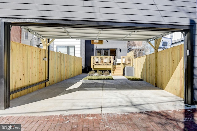 exterior space featuring a carport