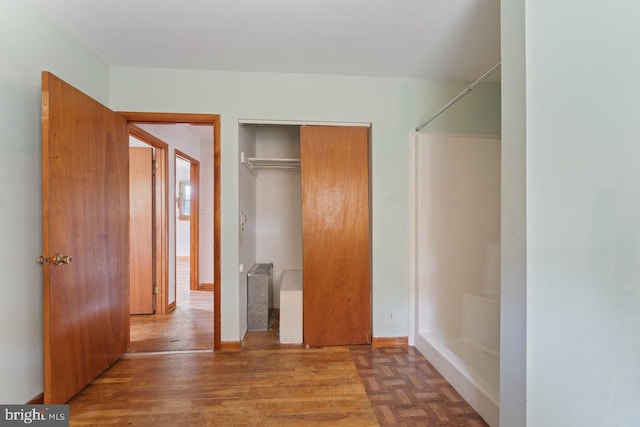 unfurnished bedroom with a closet