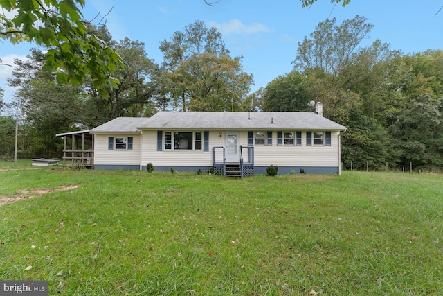 view of front of home featuring a front lawn