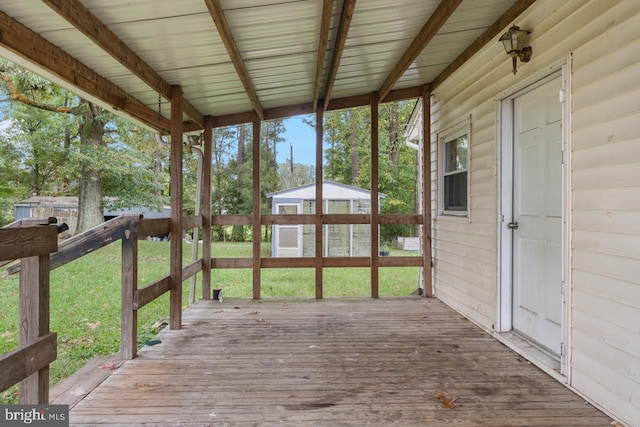 deck featuring a lawn