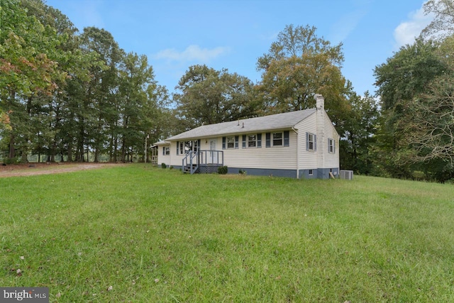 view of front of home with a front yard