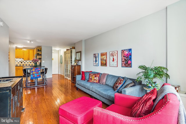 living room with hardwood / wood-style flooring