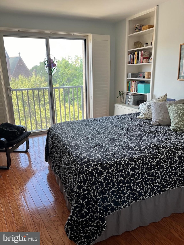 bedroom featuring hardwood / wood-style floors