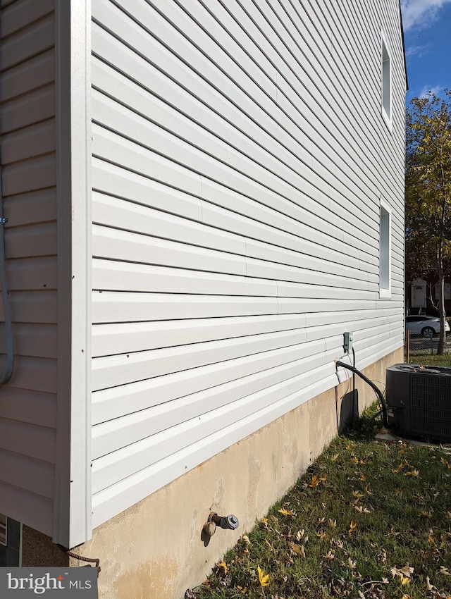 view of home's exterior with central air condition unit