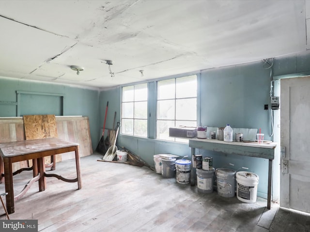 miscellaneous room featuring wood-type flooring