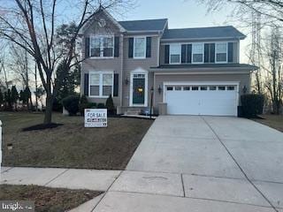 5 Cedarhouse Ct, Rosedale, MD 21237 - view of front of home with driveway, an attached garage, and a front yard