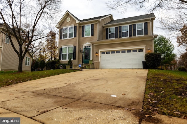 traditional home featuring driveway and a garage