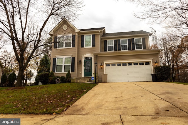 traditional-style house featuring driveway, an attached garage, and a front yard