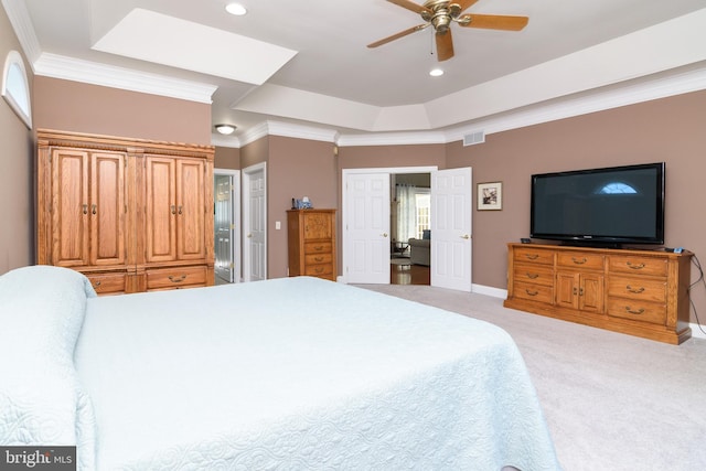 carpeted bedroom with crown molding and ceiling fan