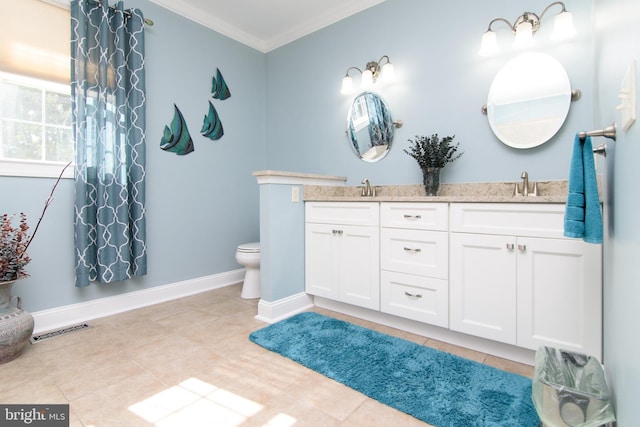 bathroom featuring tile patterned flooring, ornamental molding, vanity, and toilet