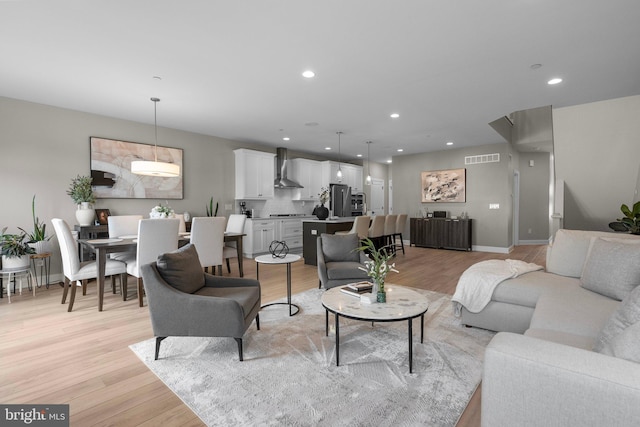 living room featuring light wood-type flooring