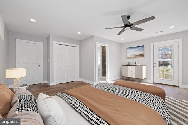 bedroom featuring ceiling fan and dark hardwood / wood-style floors