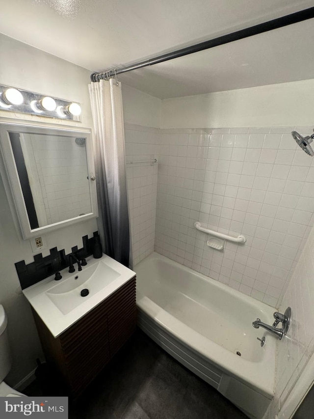 full bathroom featuring shower / bath combination with curtain, vanity, and toilet