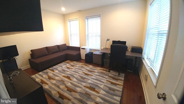 office space with wood-type flooring