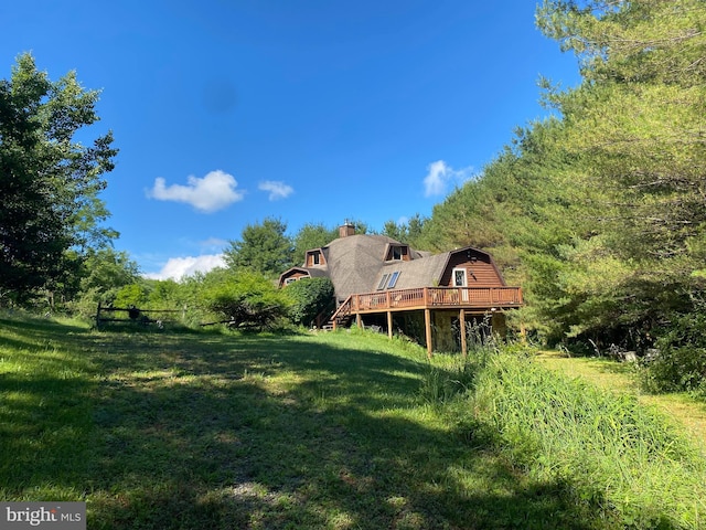 view of yard featuring a deck