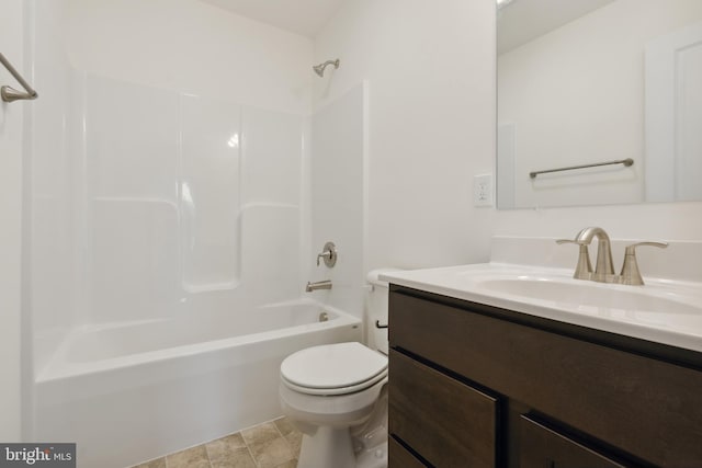 full bathroom featuring bathtub / shower combination, tile patterned floors, vanity, and toilet