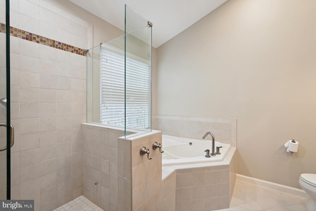 bathroom featuring shower with separate bathtub, lofted ceiling, tile patterned flooring, and toilet