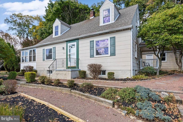 view of new england style home