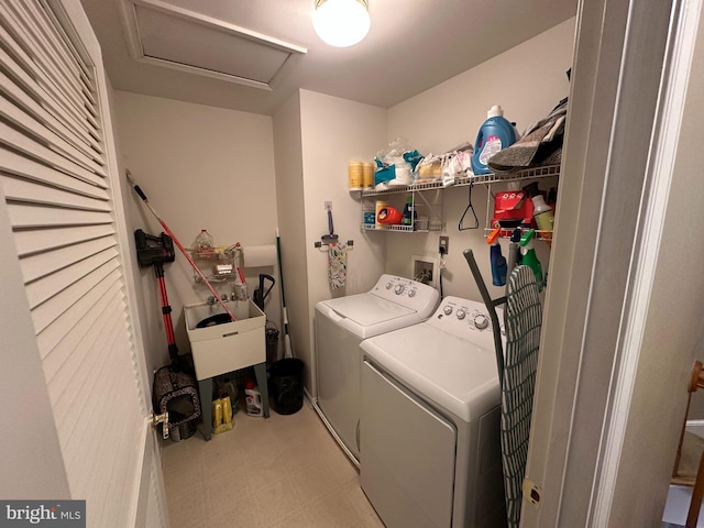 washroom with washer and clothes dryer