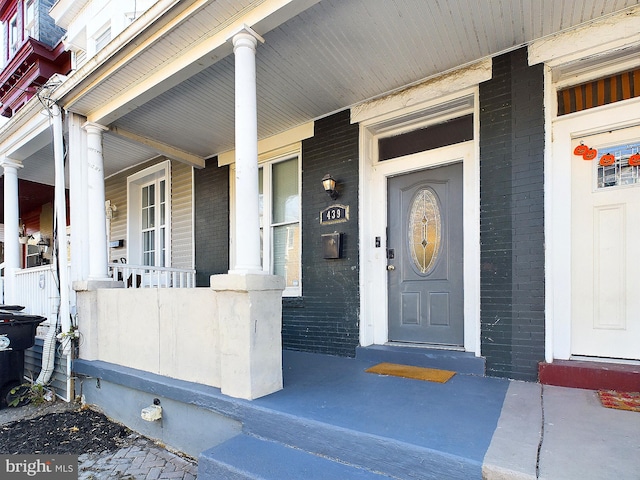 property entrance with a porch