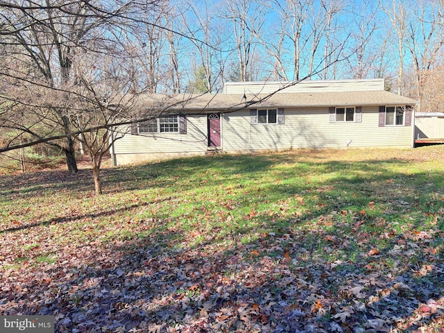 exterior space with a front yard