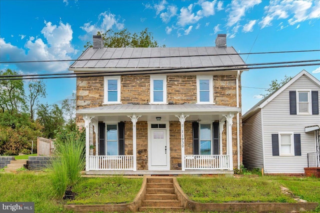 view of front of home featuring a porch