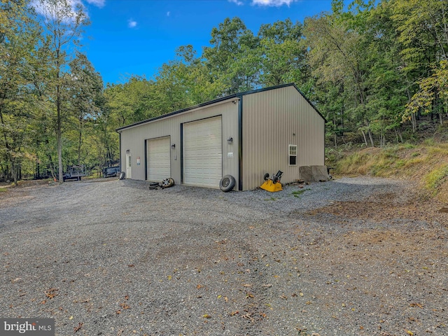 view of outdoor structure featuring a garage