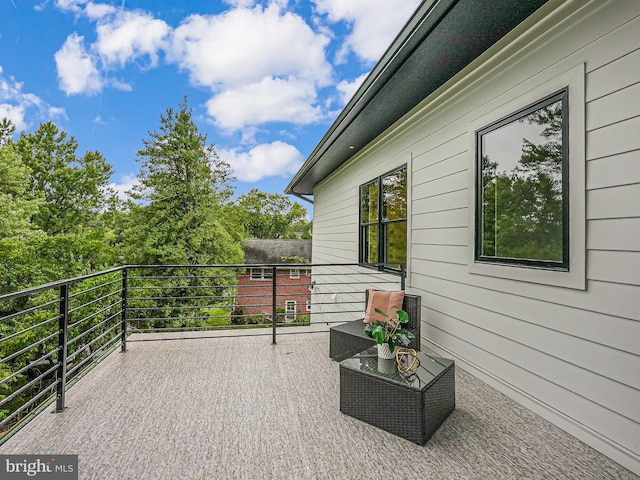 view of patio / terrace with a balcony