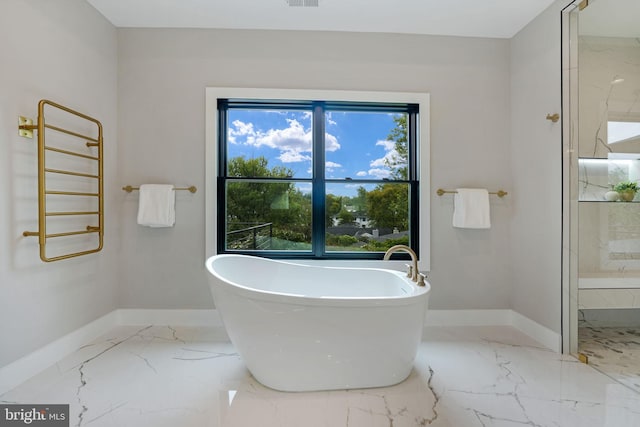 bathroom featuring a bath