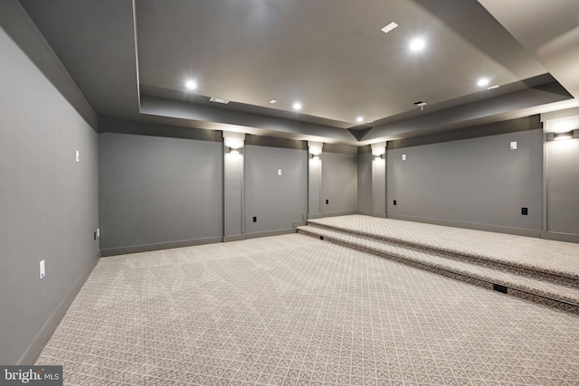 basement with light colored carpet