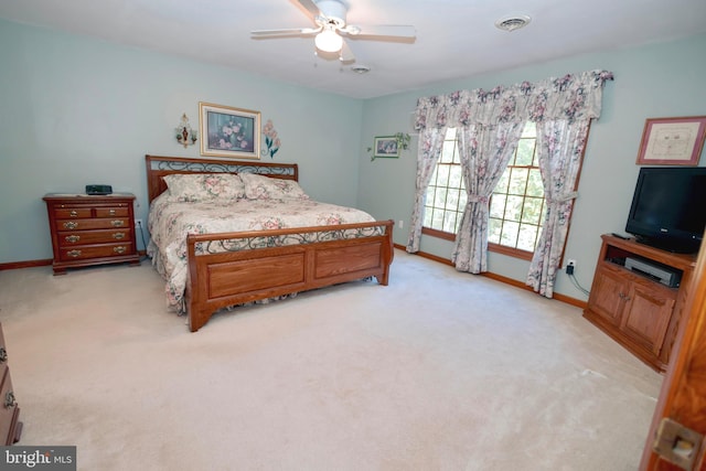 carpeted bedroom featuring ceiling fan