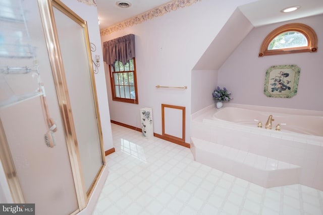 bathroom with independent shower and bath