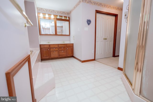 bathroom with vanity and plus walk in shower