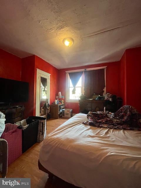 bedroom featuring light hardwood / wood-style flooring