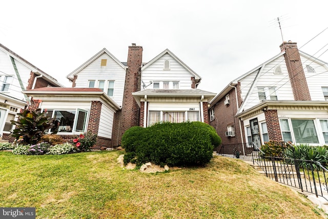 view of front facade featuring a front yard