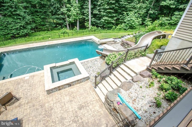 view of pool featuring a patio area