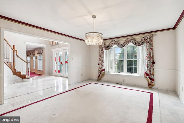 unfurnished dining area with a notable chandelier and ornamental molding